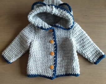 Handmade crochet baby vest with hood