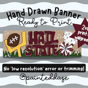 May include: A rectangular digital banner design featuring the text "HAIL STATE" in maroon letters. The graphic includes a brown football, a yellow goal post, a white pom-pom, and green grass on a tan background. A maroon star displays "2x6 print at walgreens".