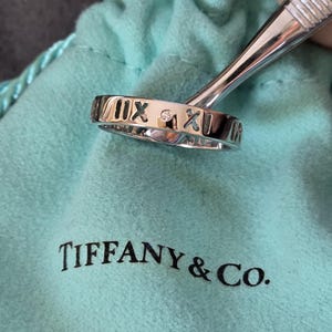 Tiffany Co 18k White Gold Diamond Pierced Atlas Band Ring Roman Numeral Size 6