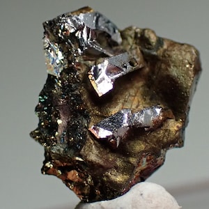 Sperrylite * silvery-bright crystals on matrix from Talnakh, Russia