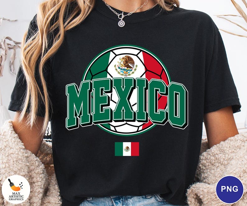 May include: A black t-shirt featuring a large graphic of a soccer ball colored with the green, white, and red of the Mexican flag. The word MEXICO is printed in large green block letters with white outlines. A small Mexican flag is centered below.