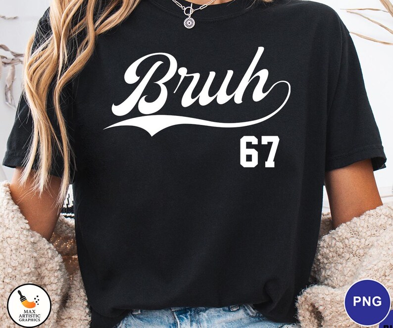 May include: Black t-shirt with the word "Bruh" in a white script font above the number "67". The shirt is a crew neck style and appears to be made of a soft material.