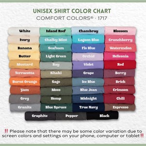 May include: A color chart for unisex shirts, featuring a wide array of Comfort Colors. The chart displays various shirt colors, including white, blue, pink, green, and neutral tones like grey and black. The text at the top reads "UNISEX SHIRT COLOR CHART".