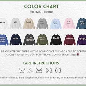 May include: Color chart of Gildan 18000 sweatshirts in various colors, including white, ash, sand, sport grey, light blue, light pink, indigo blue, heather sport royal, navy, dark heather, military green, black, maroon, and purple. Care instructions are also included.