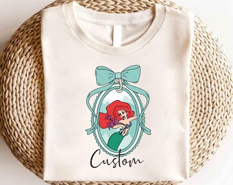 Camiseta con lazo de La Sirenita de Disney, camiseta de Ariel Flounder, camiseta de la Princesa Ariel, camiseta de viaje de Disney para niñas, camiseta del Reino Mágico