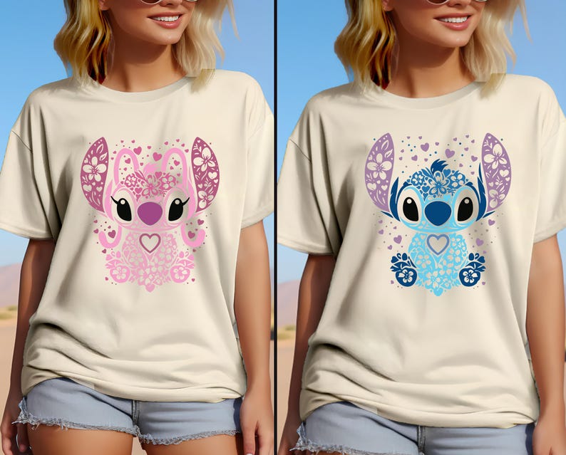 May include: Two white t-shirts with a cartoon Stitch design. One shirt features a pink Stitch with floral details and the other features a blue Stitch with floral details.