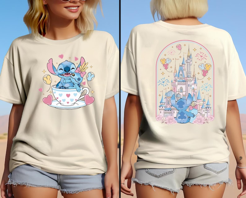 May include: Cream-colored t-shirt featuring a cartoon Stitch design. The front shows Stitch and a companion in a teacup with hearts. The back displays Stitch in front of a castle with fireworks and balloons.