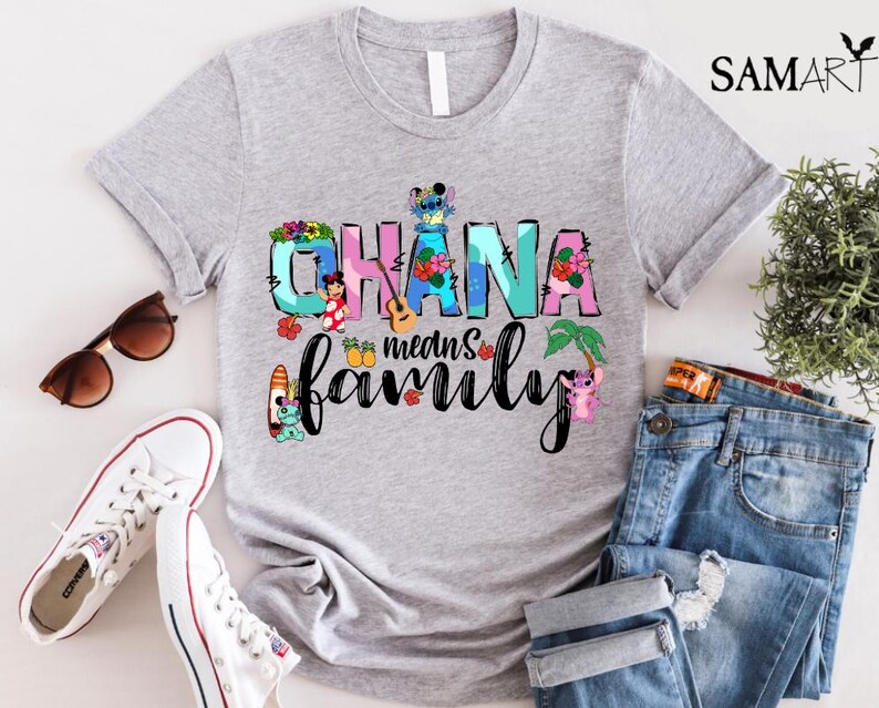 May include: Gray t-shirt with a colorful graphic that says "Ohana means family" with Stitch and other Disney characters from Lilo & Stitch.