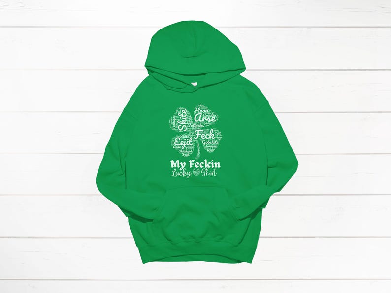 May include: Green hooded sweatshirt with a white four-leaf clover graphic that says "My Feckin Lucky Shirt".