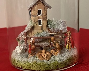 Snow-covered artisan nativity scene (Made in Italy)