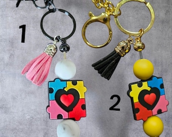 Autism Awareness Keychain featuring Fidget Spinner Design