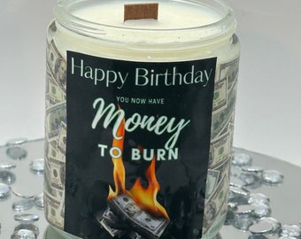 Money to Burn!  Gift a 10 oz soy candle of money to burn to everyone who assumes you are endlessly loaded with cash.  Fruit Loop scent!