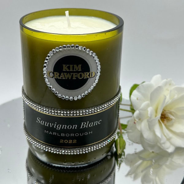 Kim Crawford Sauvignon Blanc gorgeous 22 oz soy candle w/brilliant diamonds.  Warm coastal breeze scent. Handcut & poured in small batches.