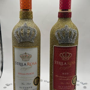 Stella Rosa. Hand-adorned bottle with crown, glitter color of your choice, and rhinestones to frame the label.  Specify: wine bottle flavor.