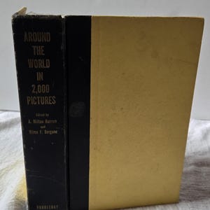 May include: A black hardback book titled "Around the World in 2,000 Pictures" with gold lettering. The book is edited by A. Milton Runyon and Vilma F. Bergane and published by Doubleday.