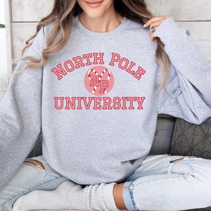 Cute North Pole University Holiday Spirit Crewneck Sweatshirt, Women&#39;s Holiday Crewneck Pullover, Santa&#39;s Workshop Sweater, Christmas Gift
