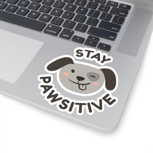 Adorable pegatina de perro de dibujos animados 'Stay Pawsitive' - Perfecta para los amantes de los perros - AnnGeeGifts