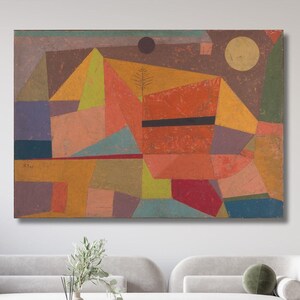 May include: Abstract geometric painting with a mix of red, orange, yellow, green, blue, and purple colors. The painting is divided into many different shapes and forms, creating a dynamic and visually interesting composition.