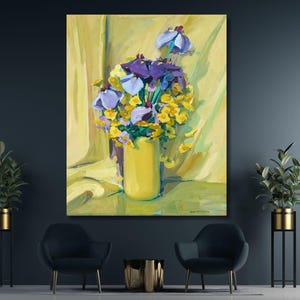 May include: An oil painting on canvas depicting a vibrant bouquet of purple irises and small yellow flowers arranged in a solid yellow vase. The background features soft, draped yellow fabric with visible brushstrokes and light shadows.
