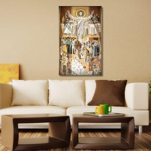 May include: A framed mosaic artwork depicting a religious scene with a central figure in white robes with arms raised, surrounded by other figures in various colors and poses.