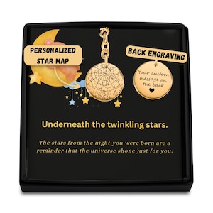 May include: A gold-coloured pendant with a star map design, attached to a chain, and a smaller round pendant with a heart. Text on the box reads "PERSONALIZED STAR MAP" and "BACK ENGRAVING". The text "Underneath the twinkling stars" is also visible.