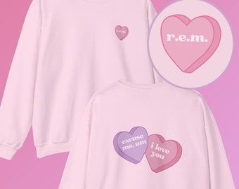 R.E.M. Ariana Candy Heart Grande Sweater Unisex Heavy Blend™ Crewneck Sweatshirt Rem Beauty Eternal Sunshine Blush hypernova