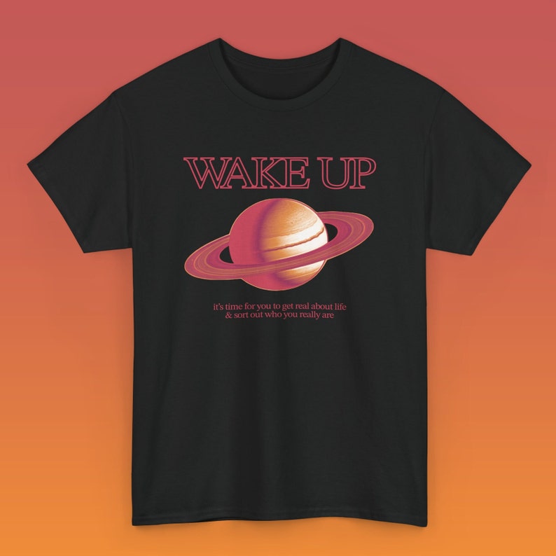 Saturn Returns Interlude Ariana Grande Unisex Heavy Cotton Tee eternal sunshine combined with rem beauty hypernova hotel wicked image 1
