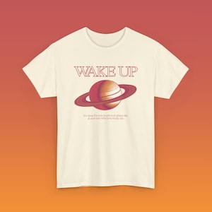 Saturn Returns Interlude Ariana Grande Unisex Heavy Cotton Tee eternal sunshine combined with rem beauty hypernova hotel wicked image 3