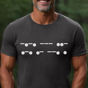 May include: A dark gray t-shirt with a white design of Morse code representing the letters "I love you".