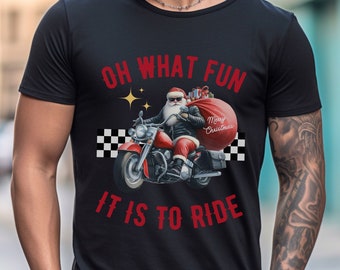 May include: Black t-shirt with a red and white graphic of Santa Claus riding a motorcycle with the text "Oh What Fun It Is To Ride".