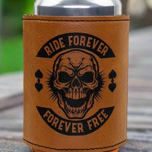 May include: Brown leather can cooler with a black skull graphic and the text "Ride Forever Forever Free".