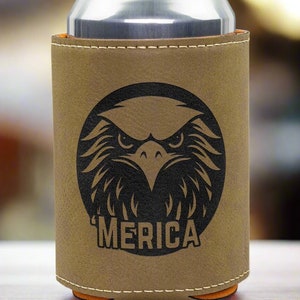 May include: A brown leather can cooler with an eagle head graphic and the word "MERICA" printed on it.