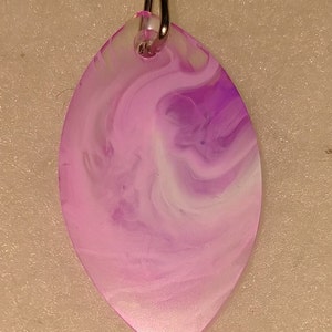 Oval pink, purple, and white resin pendant