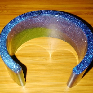 Glittery blue and green resin cuff bracelet