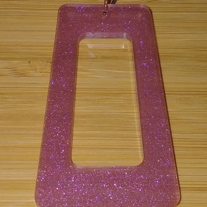 Glittery pink resin pendant