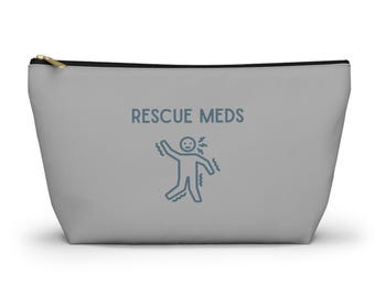 May include: A light gray zippered pouch with the text "RESCUE MEDS" above a blue stick figure illustration. The figure appears to be in distress, with wavy lines around it.