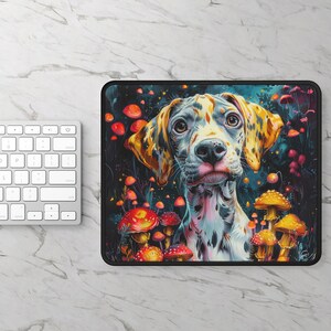 May include: A colourful mouse mat featuring a cartoon Dalmatian puppy with blue, yellow and orange spots. The puppy is surrounded by red and yellow mushrooms with white spots. The background is a dark blue with glowing lights.