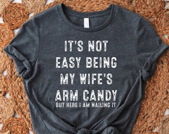 It's Not Easy Being My Wife's Arm Candy Shirt, Husband Gift from Wife, Best Husband Birthday Tee, Fathers Day Gift,Dad Joke, Funny Shirt Men