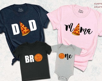 May include: A set of four t-shirts with a pizza slice graphic and the words "DAD", "MAMA", "BRO", and "one".