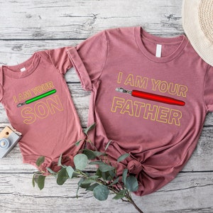 a couple of shirts that are on top of a table