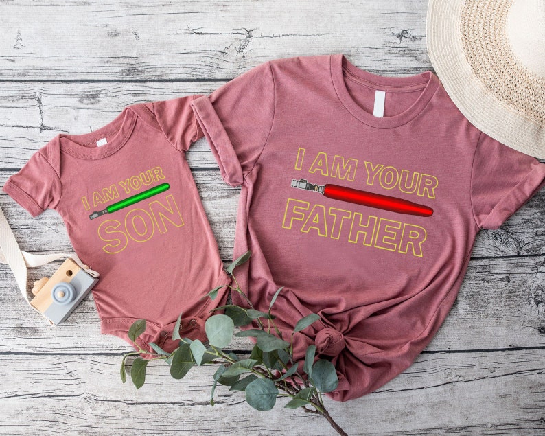 a couple of shirts that are on top of a table