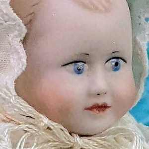 Awestruck eerie Victorian baby doll porcelain biscuit bisque doll linen and lace hand-made garments