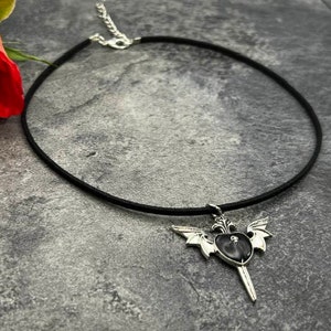 Black flat suede choker with gothic black heart and wing charm pendant