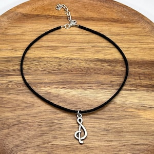 Black flat suede choker with note charm pendant