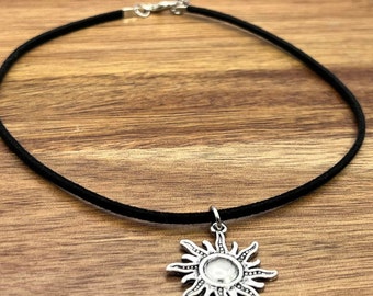 Black flat suede choker with sun charm pendant