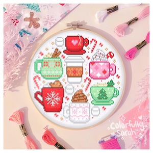 May include: A cross-stitch pattern featuring a variety of winter beverages, including hot chocolate, coffee, and tea. The pattern is surrounded by candy canes and snowflakes. The pattern is titled "Colorfully Sarah".