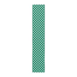 May include: A long, thin, green and white checkered ribbon.