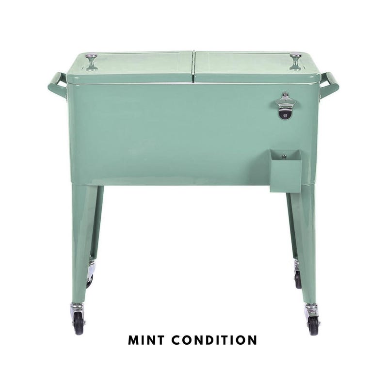 May include: A mint green metal cooler with a bottle opener and a small storage compartment. The cooler has a hinged lid, handles, and is mounted on wheels. The text "MINT CONDITION" is printed at the bottom.