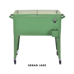 May include: A green metal cooler with a bottle opener and a small storage compartment. The cooler has two hinged lids, handles on the sides, and is mounted on wheels. The text "URBAN JADE" is at the bottom.