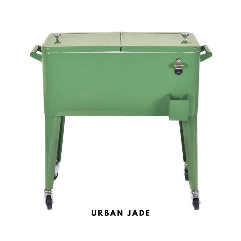 May include: A green metal cooler with a bottle opener and a small storage compartment. The cooler has two hinged lids, handles on the sides, and is mounted on wheels. The text "URBAN JADE" is at the bottom.